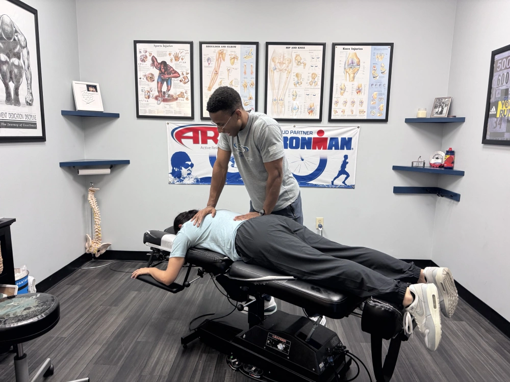 picture of Gabriel Williams treating a patient